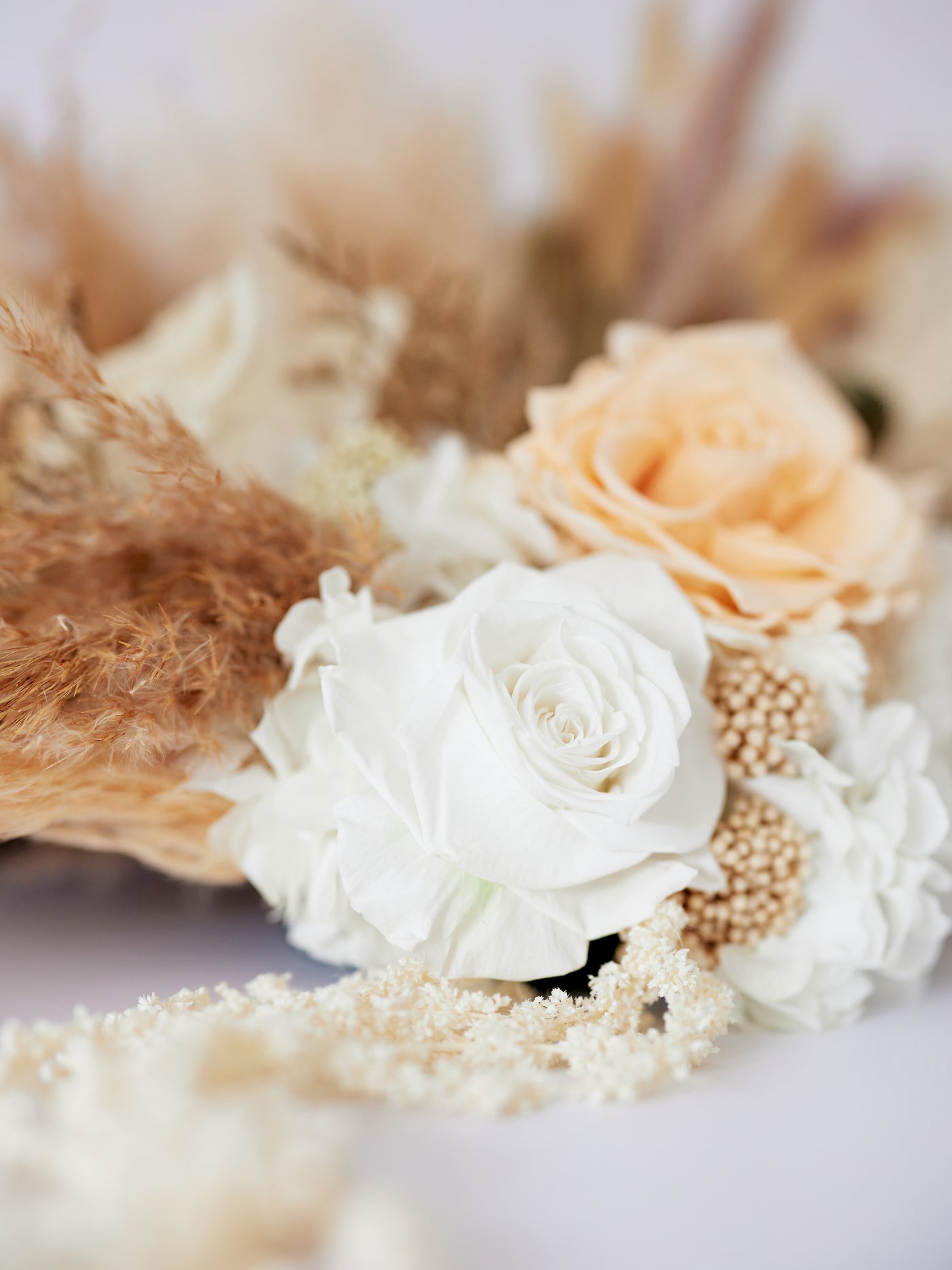 Centerpiece With Beige And White Preserved Flowers For Your Wedding