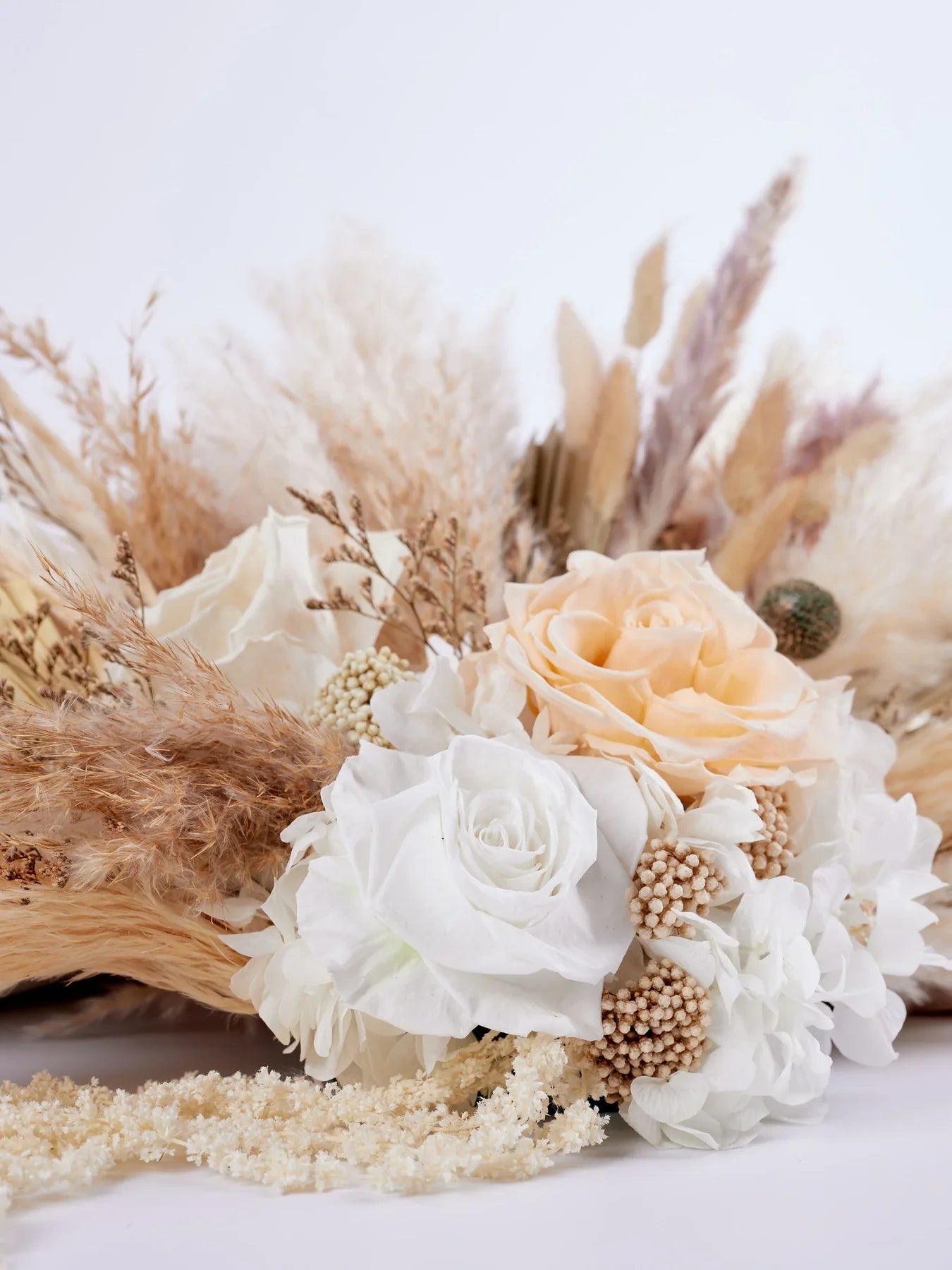 Centerpiece With Beige And White Preserved Flowers For Your Wedding