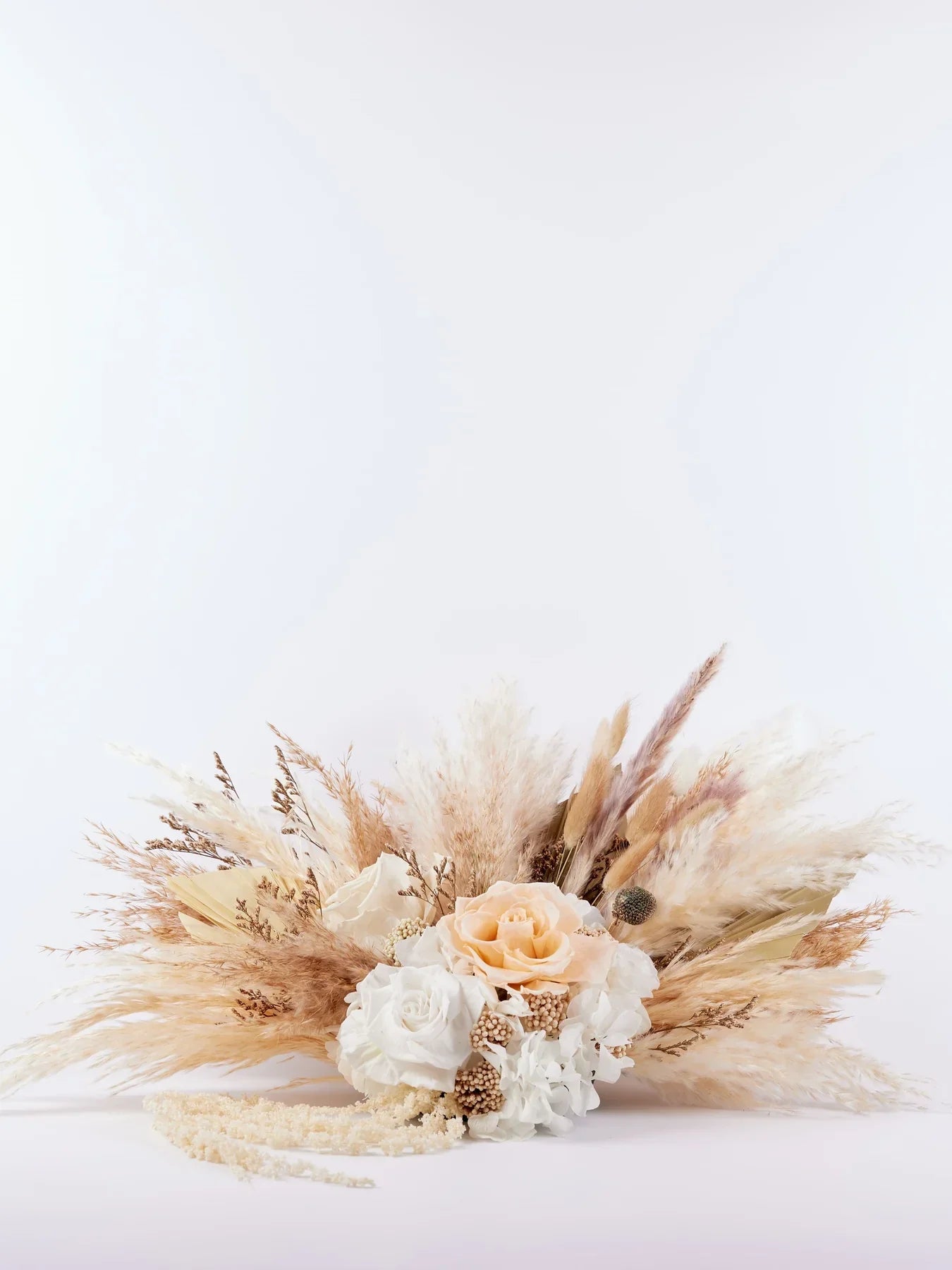 Centerpiece With Beige And White Preserved Flowers For Your Wedding