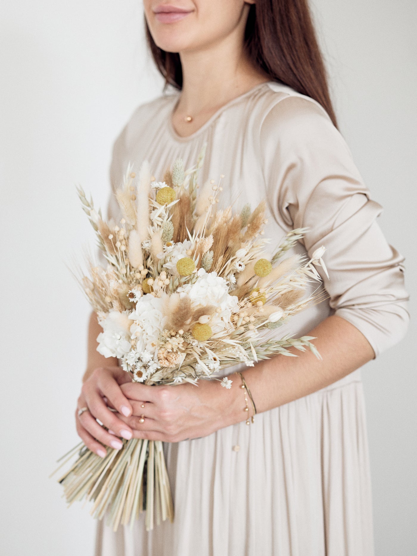 Bridal bouquet with unique rustic flower of cream wildflowers