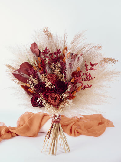 Bridal burgundy bouquet with terracotta flowers for your special day