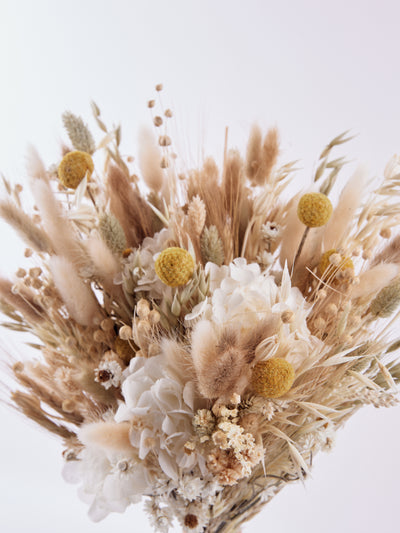 Bridal bouquet with unique rustic flower of cream wildflowers