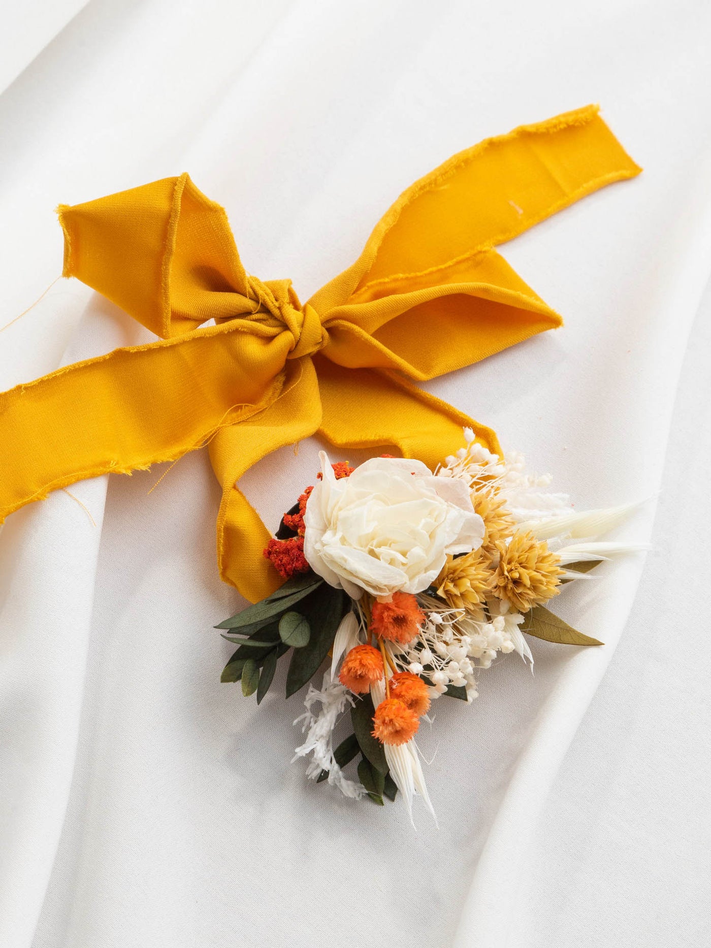 Wrist Corsage With Terracota And Yellow Flowers