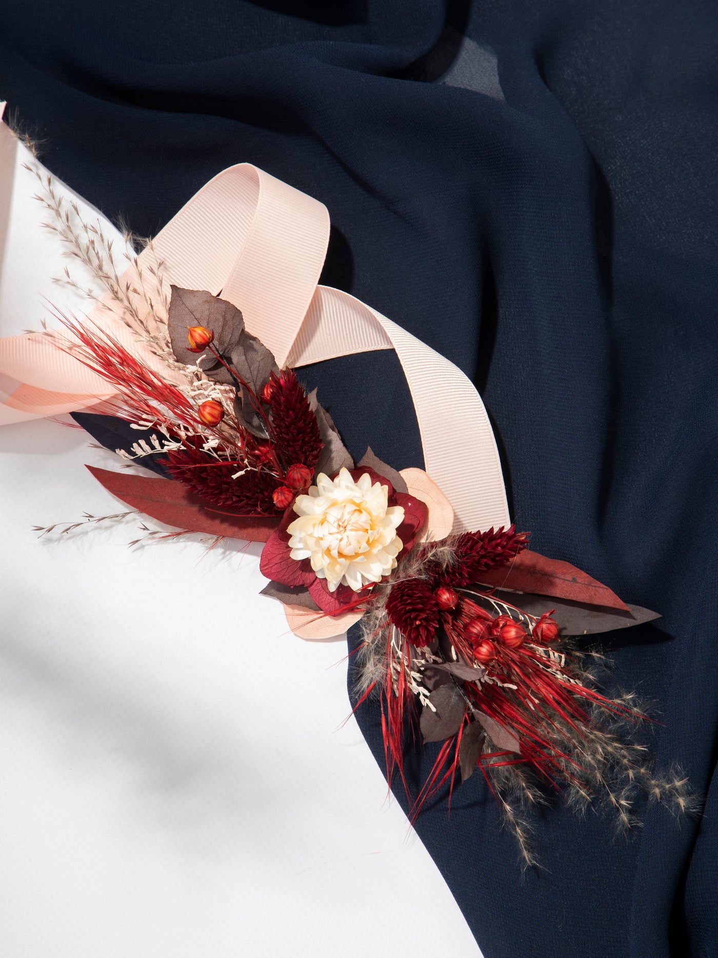 Red And Burgundy Wrist Corsage With Dusty Flowers