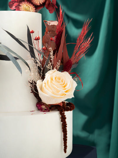 Red And Burgundy Cake Toppers With Dusty Flowers