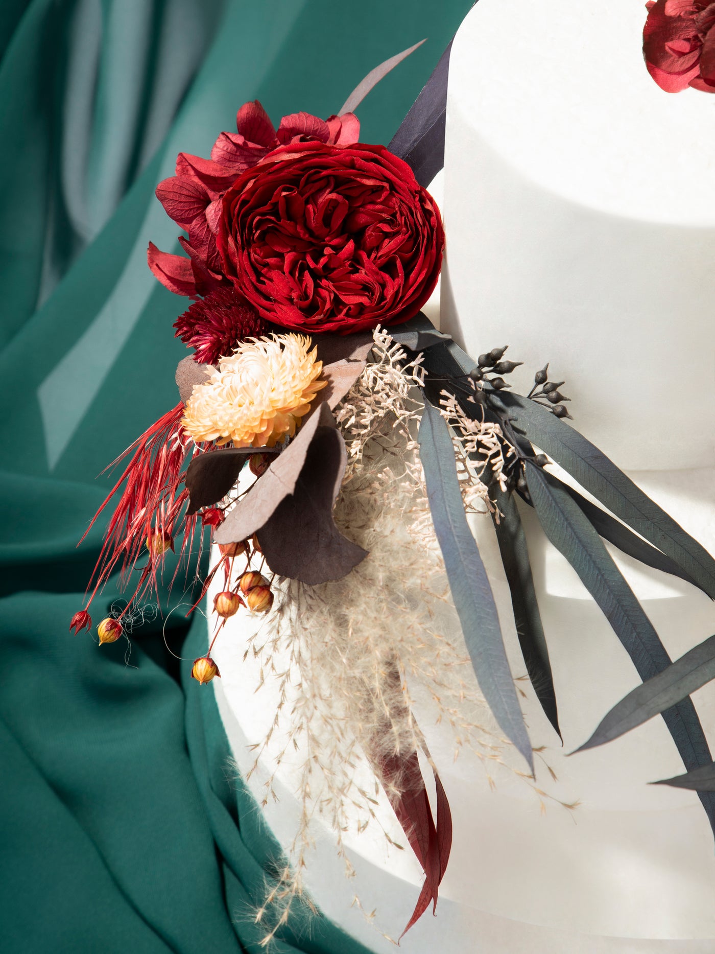 Red And Burgundy Cake Toppers With Dusty Flowers