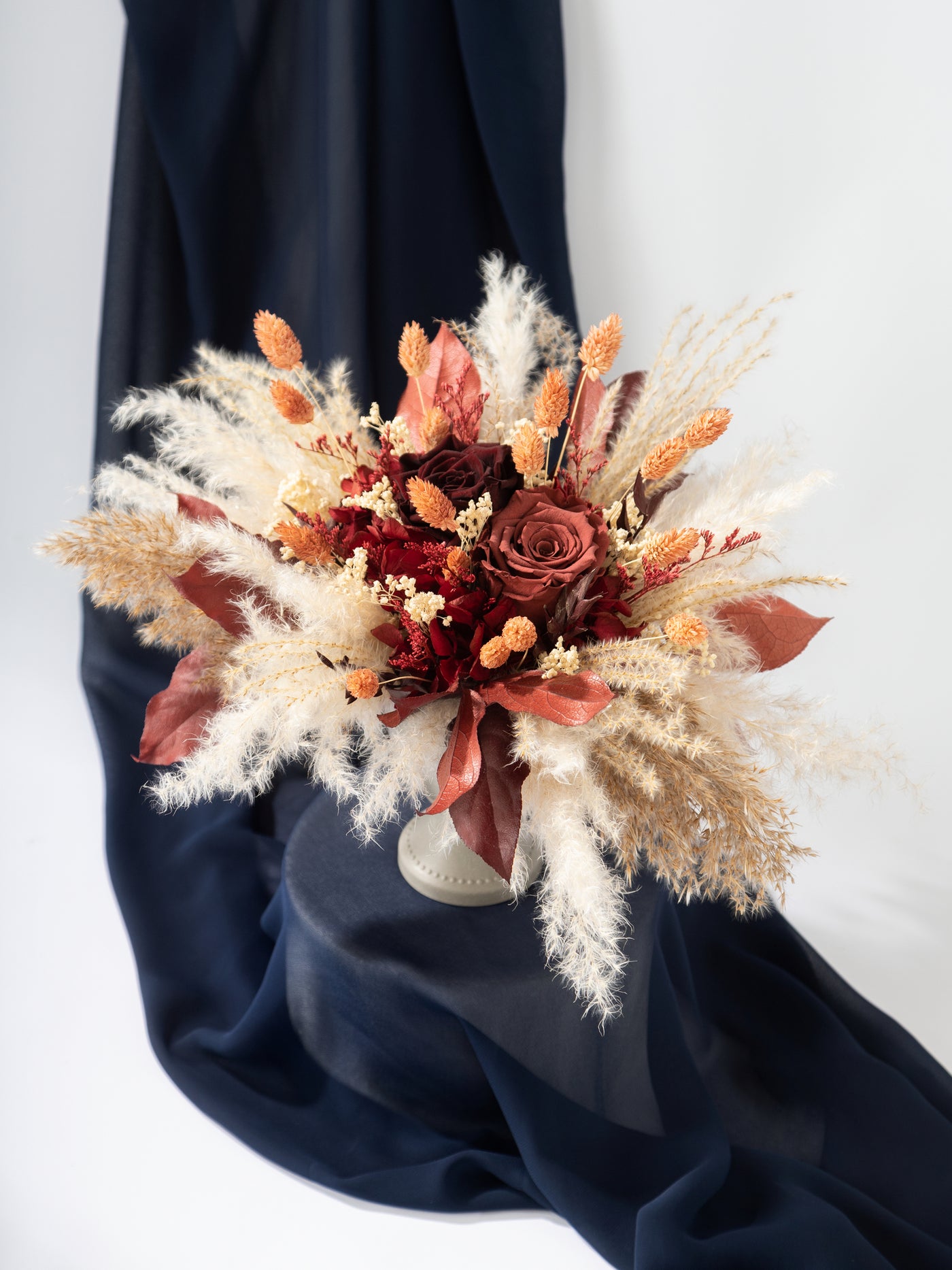 Centerpiece Burgundy With Terracotta Flowers For Your Special Day