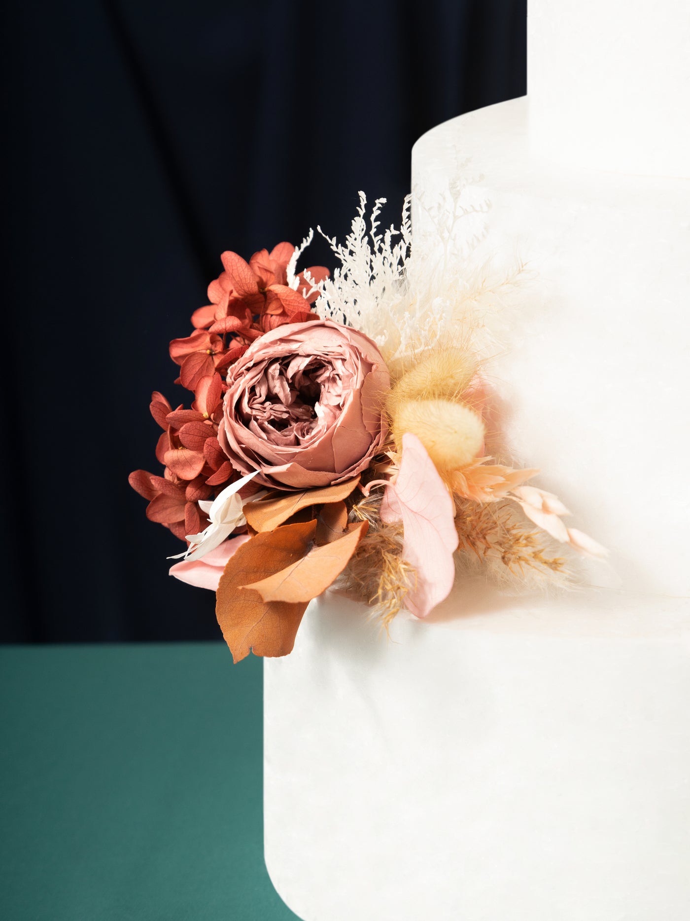 Cake Topper With Dusty Rose Flowers, Pampas Grass, And Eucalyptus