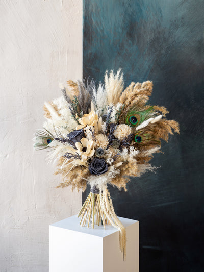 Dusty blue feather boho bouquet