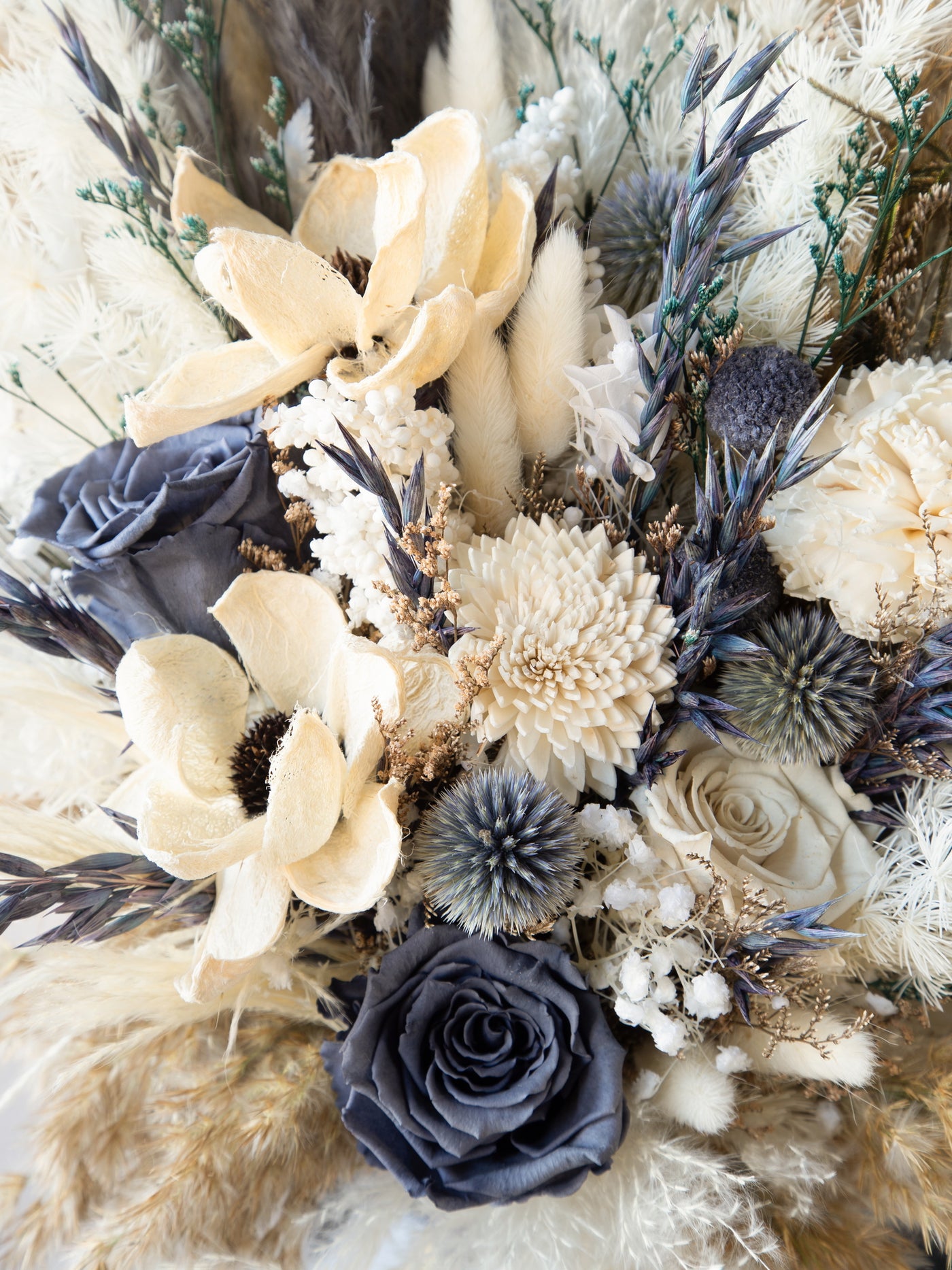 Dusty blue feather boho bouquet