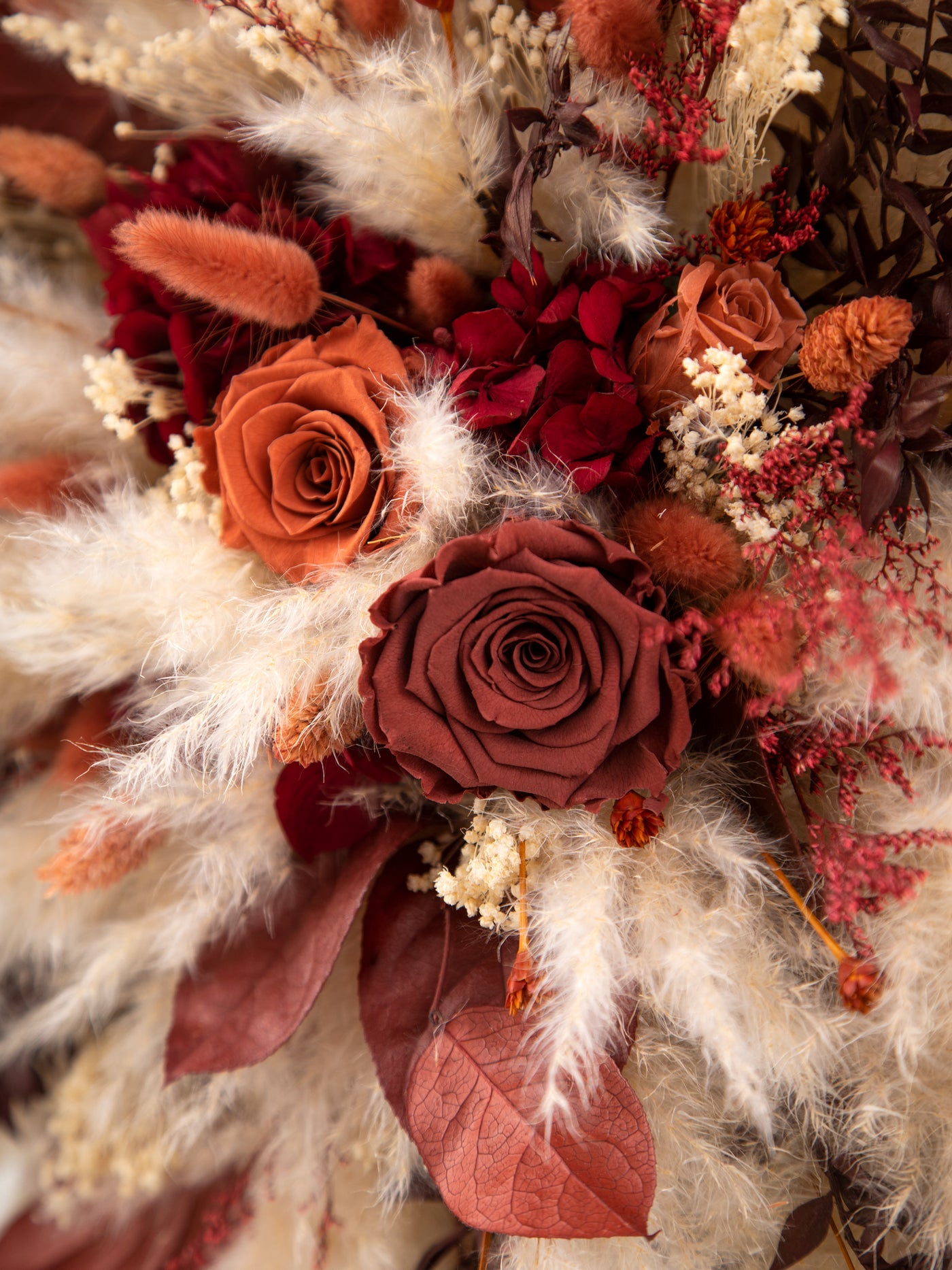 Arch Burgundy With Terracotta Flowers For Your Special Day