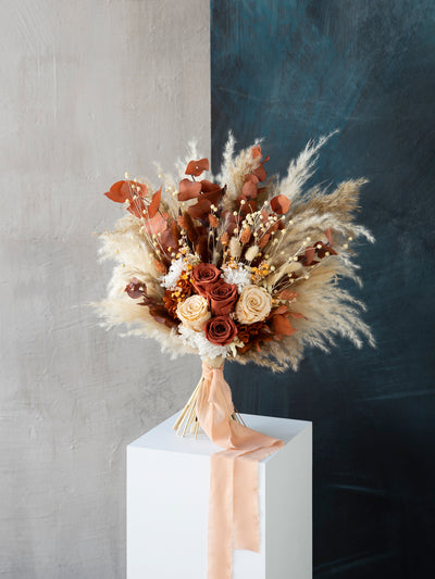 Rust and terracotta boho preserved roses wedding bouquet