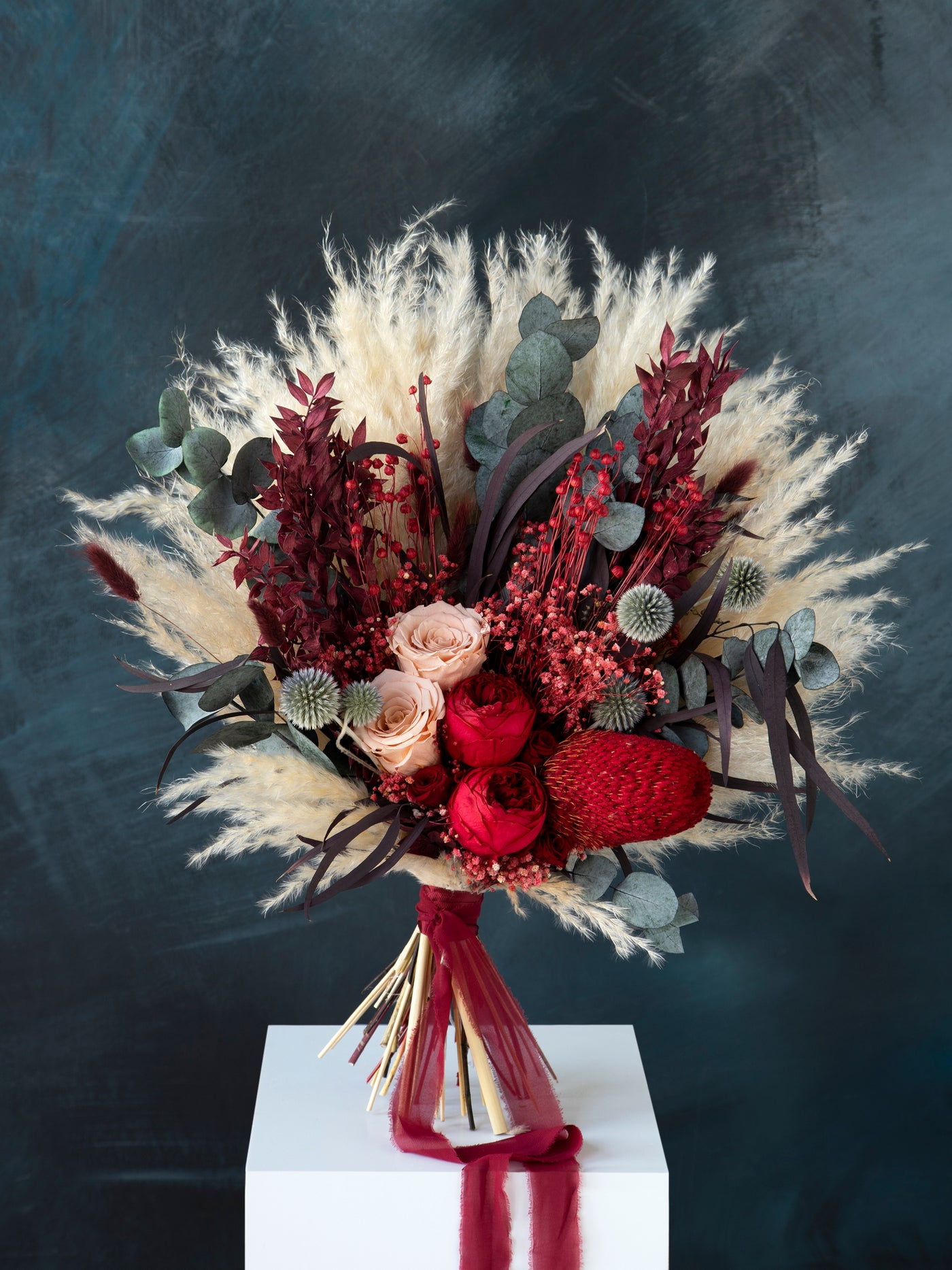 Greenery and red peony wedding bouquet