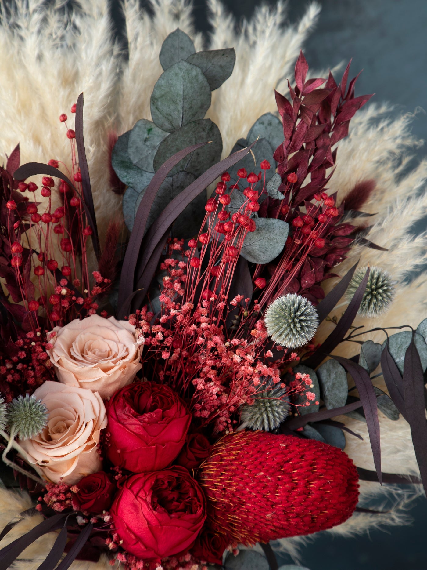 Greenery and red peony wedding bouquet