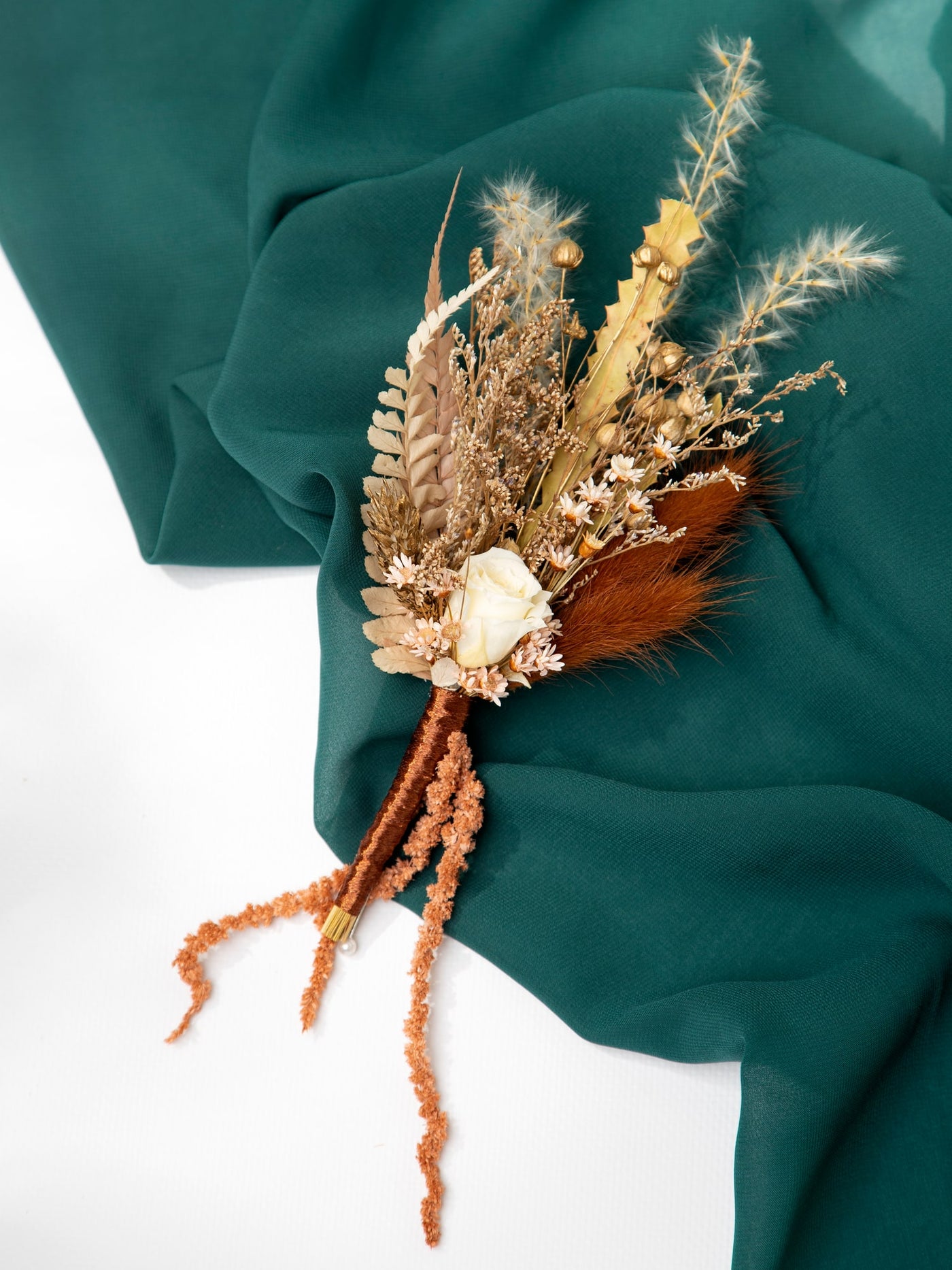 Boutonniere With Gold And Blush Flowers