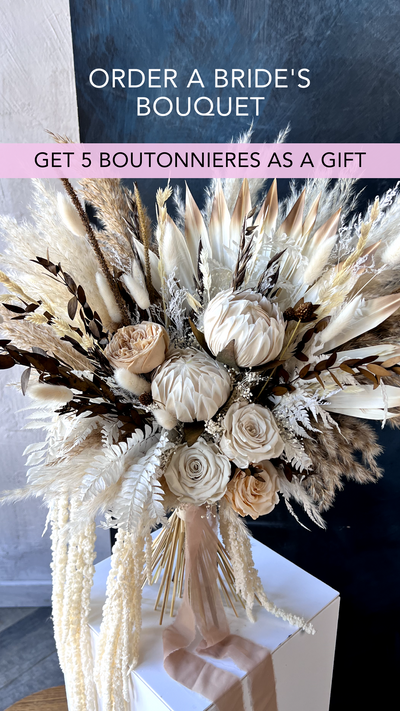 Kings protea boho white and russet colored bridal bouquet