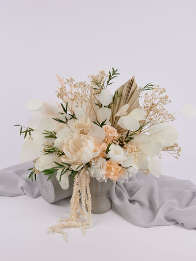 centerpiece is standing near grey fabric on white background 6