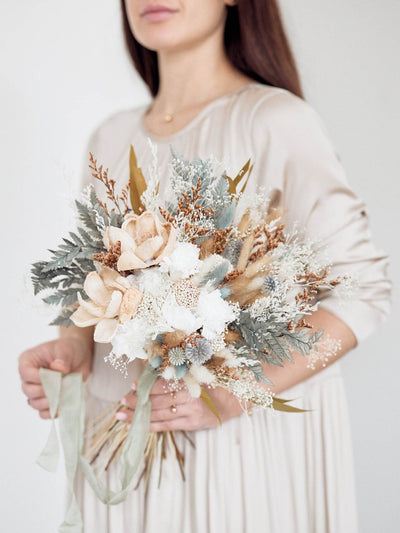 Girl with Bridal rust bouquet of sage green flowers