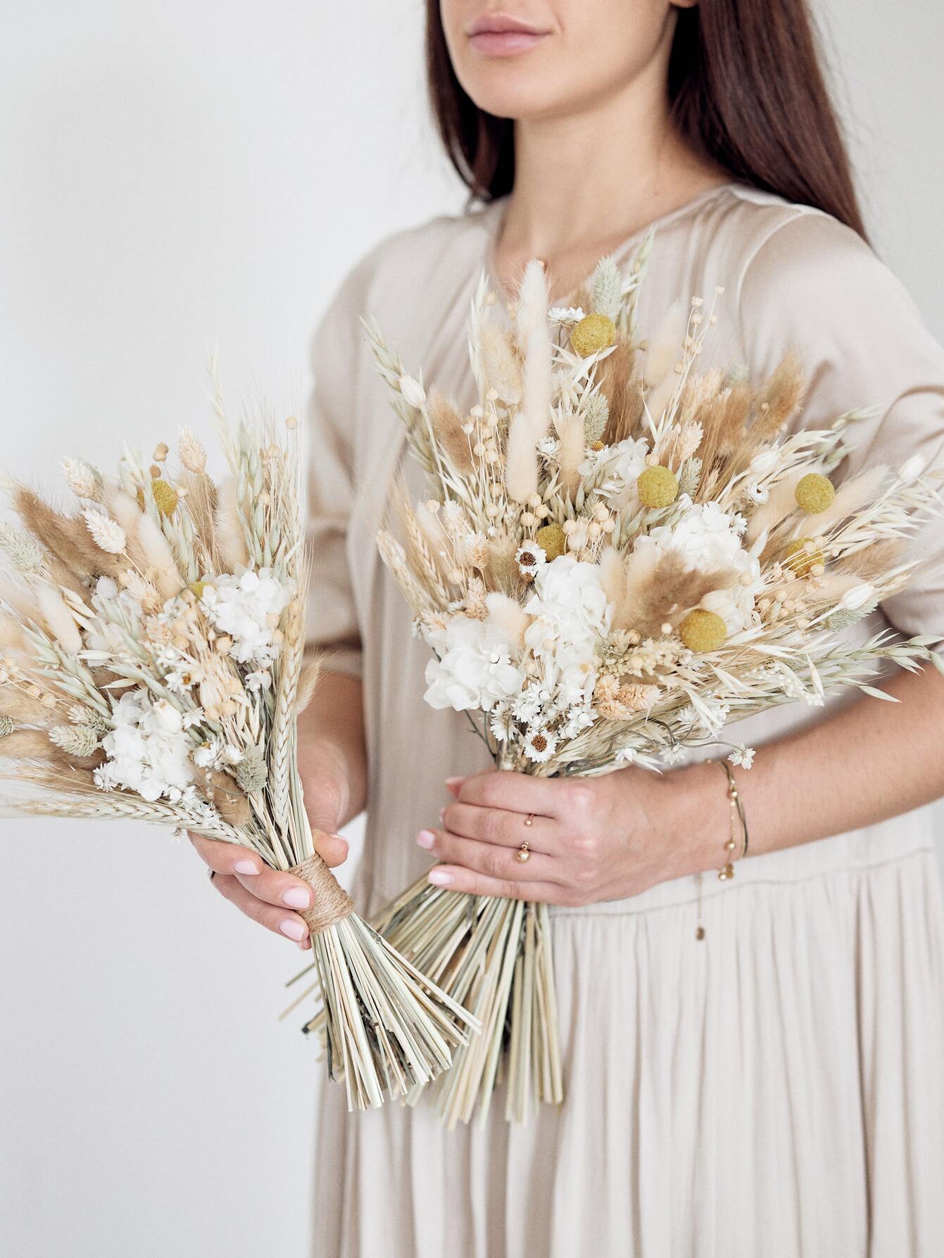 Girl with bridal bouquet of cream rust collection