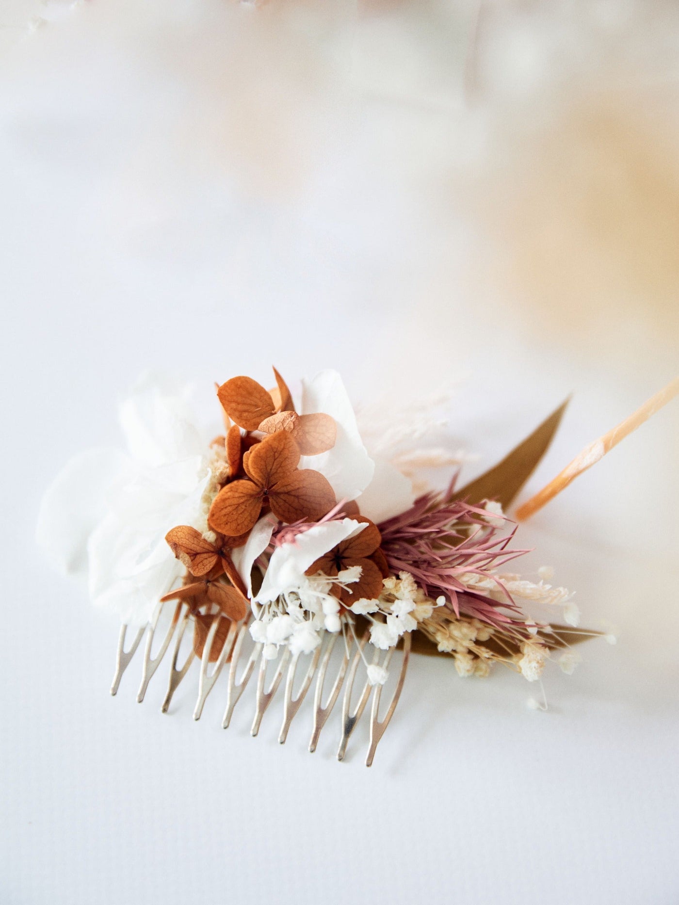 hair comb is lying on white background, close up view