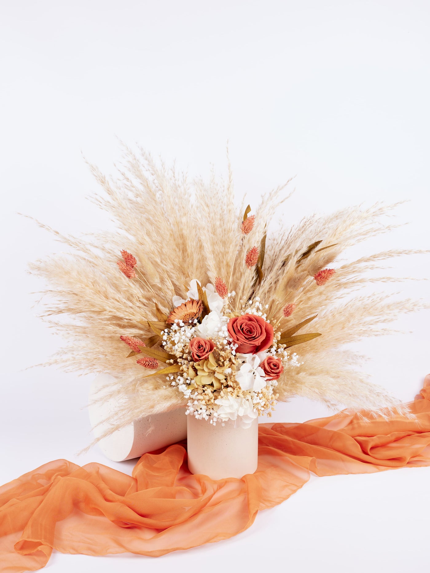 centerpiece is standing on terracota organza