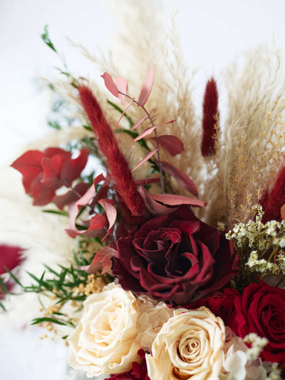 wedding bouquet with roses and pampas grass