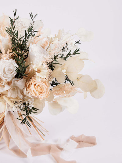 Bridal bouquet with preserved dusty roses, hydrangea and some chamomile