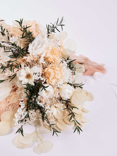 Bridal bouquet with preserved dusty roses, hydrangea and some chamomile