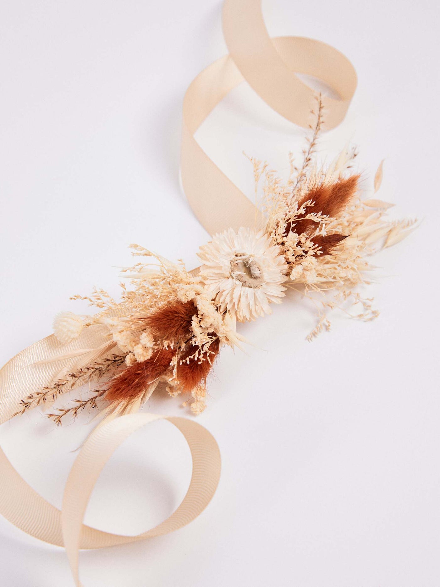 corsage is lying on white background 2