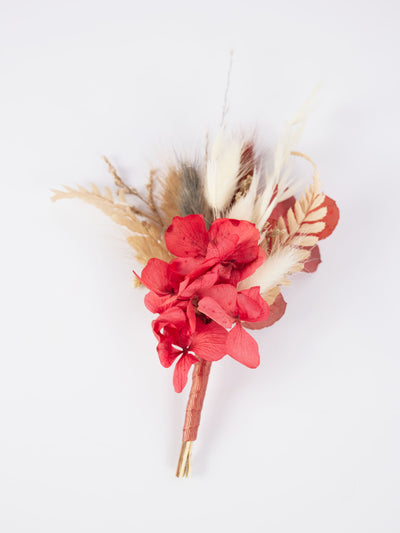 boutonniere is lying on a white background