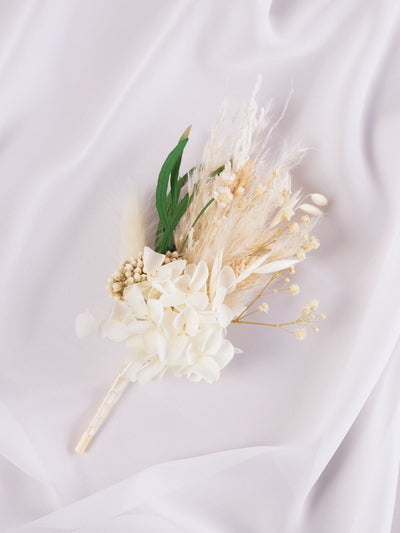 boutonniere on white silk