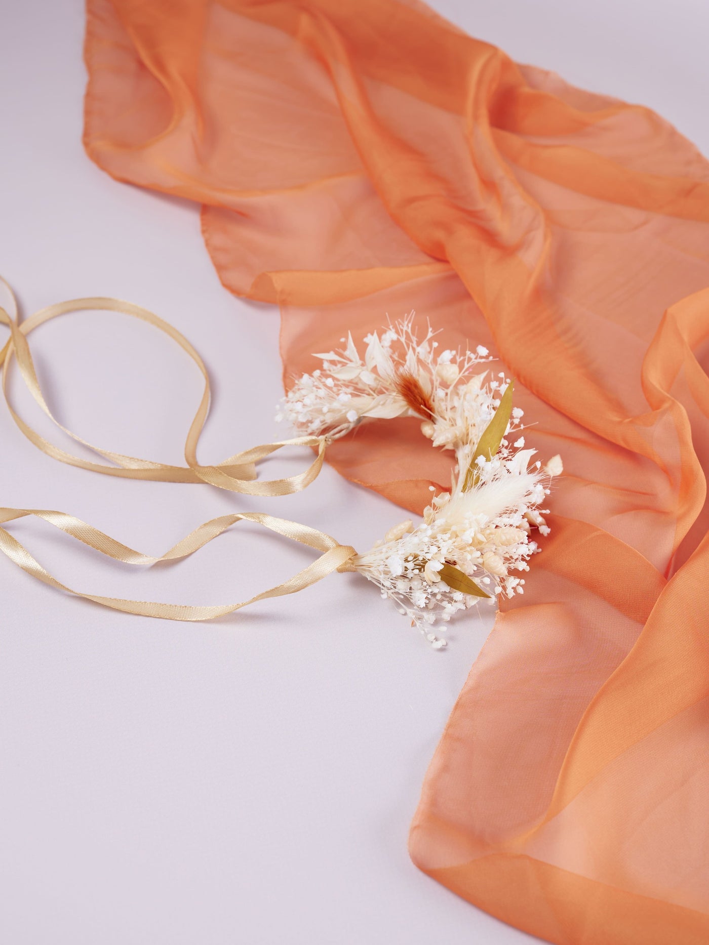 wedding wreath on white background and terracotta organza cloth 2