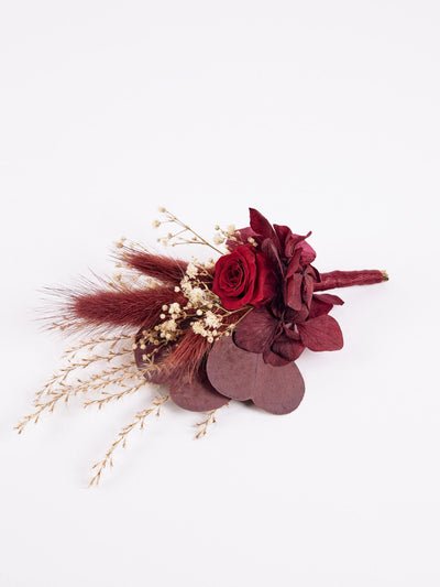 boutonniere is lying on white background 2