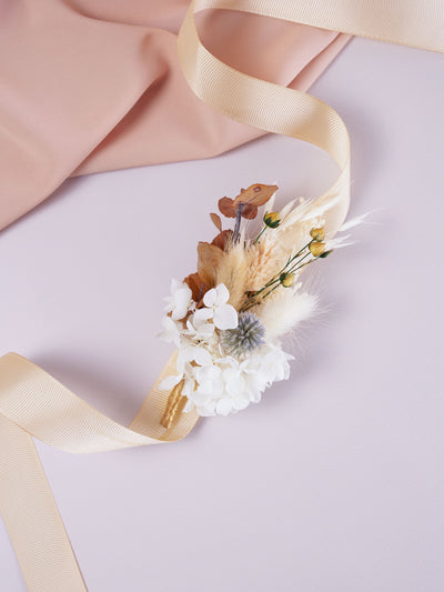 corsage is lying on white background