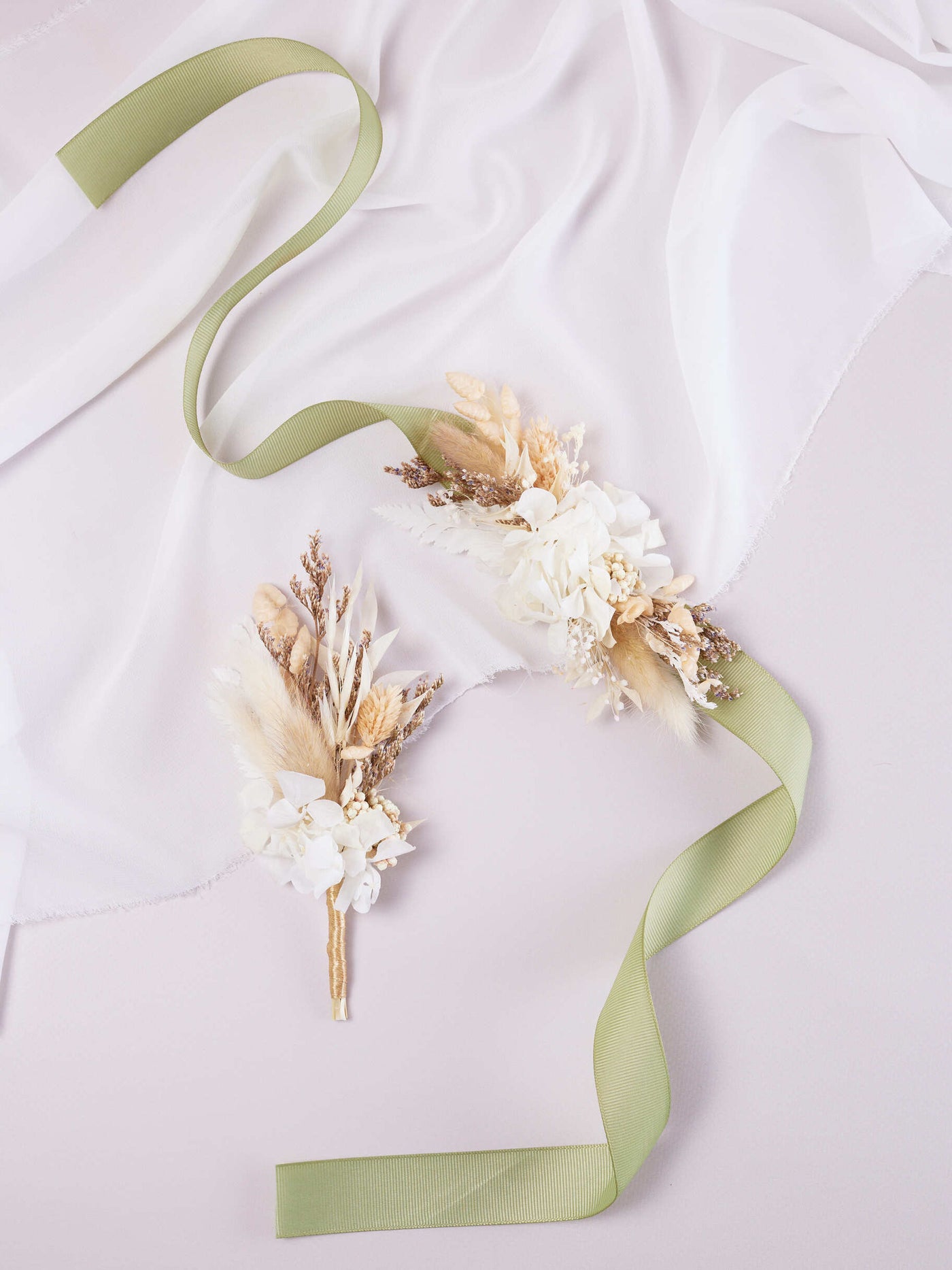 corsage on white organza near boutonniere